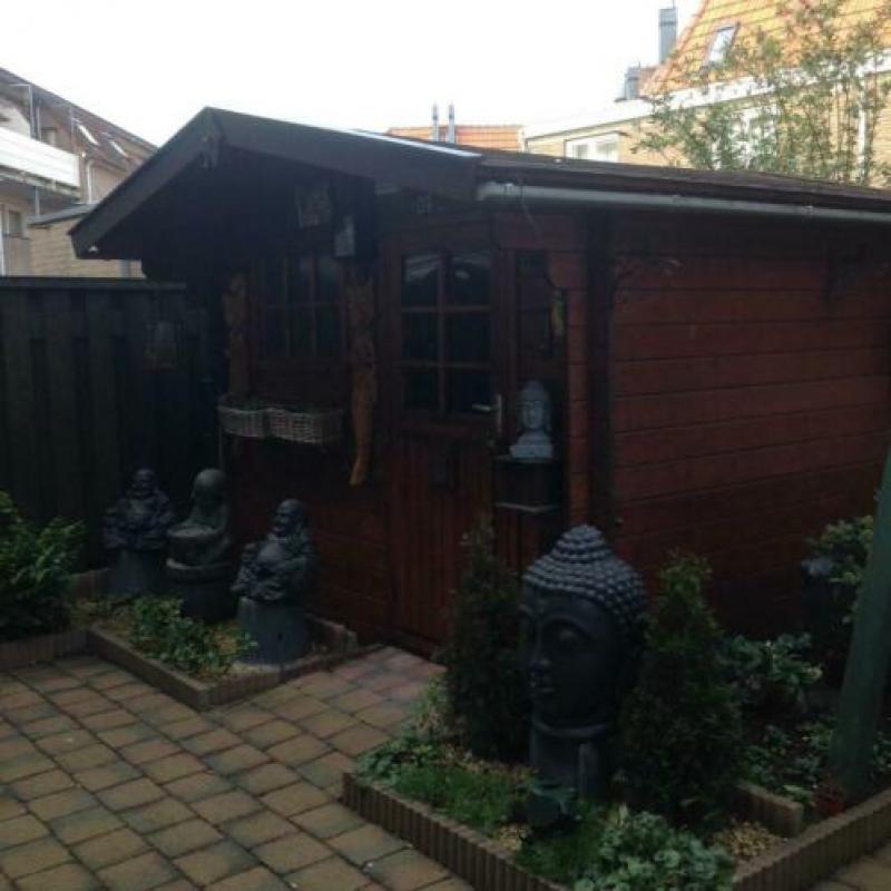 Te koop tuinhuis met luifel in prima staat