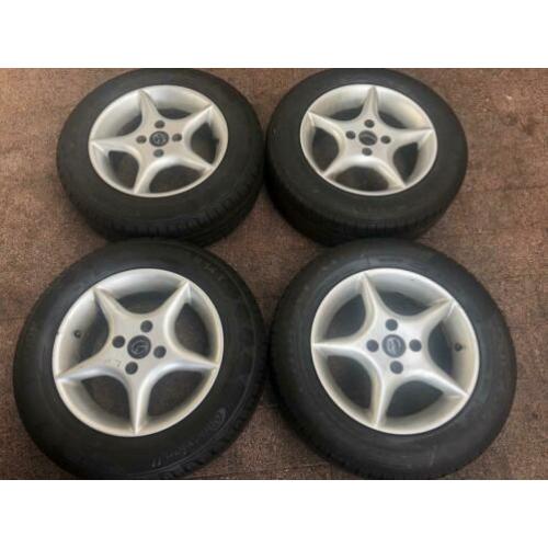 14 inch Mazda 2/323 lichtmetalen velgen + zomerbanden 7mm