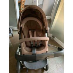 Stokke onderstel met stokke maxicosi en stokke buggy.