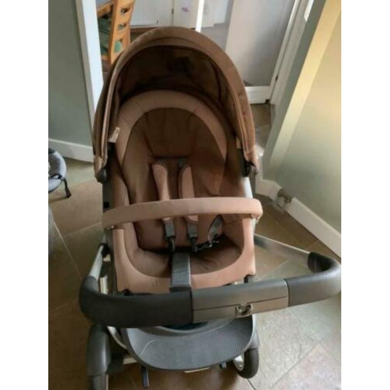 Stokke onderstel met stokke maxicosi en stokke buggy.