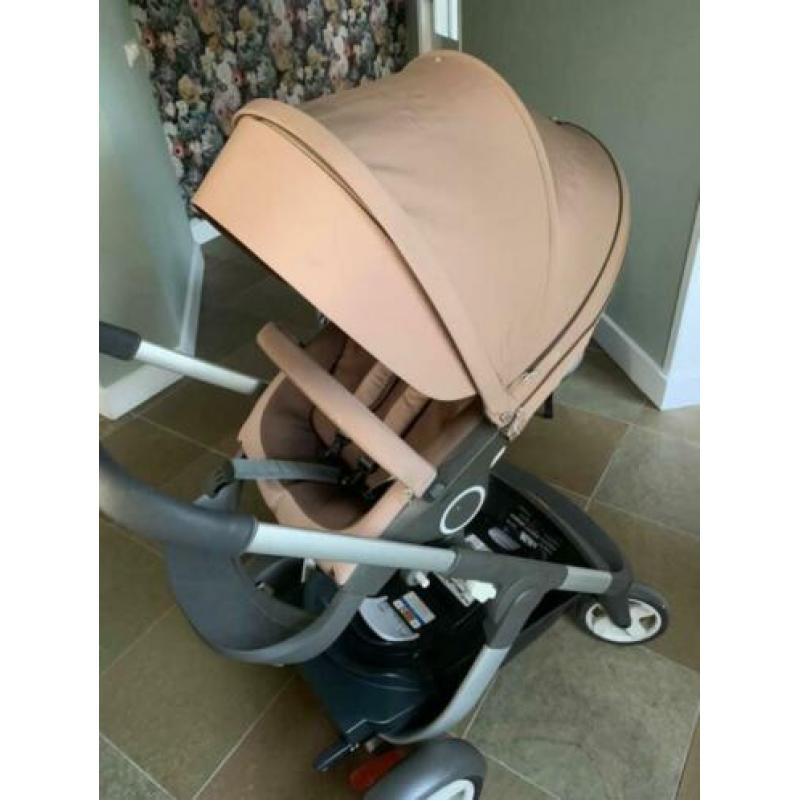 Stokke onderstel met stokke maxicosi en stokke buggy.