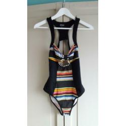 Freak of Nature studded bodysuit maat 8/36.
