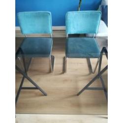 Glazen eettafel met antraciet metalen onderstel