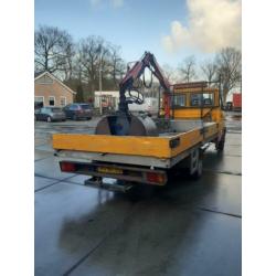 Iveco Daily incl kraan en knijpbak