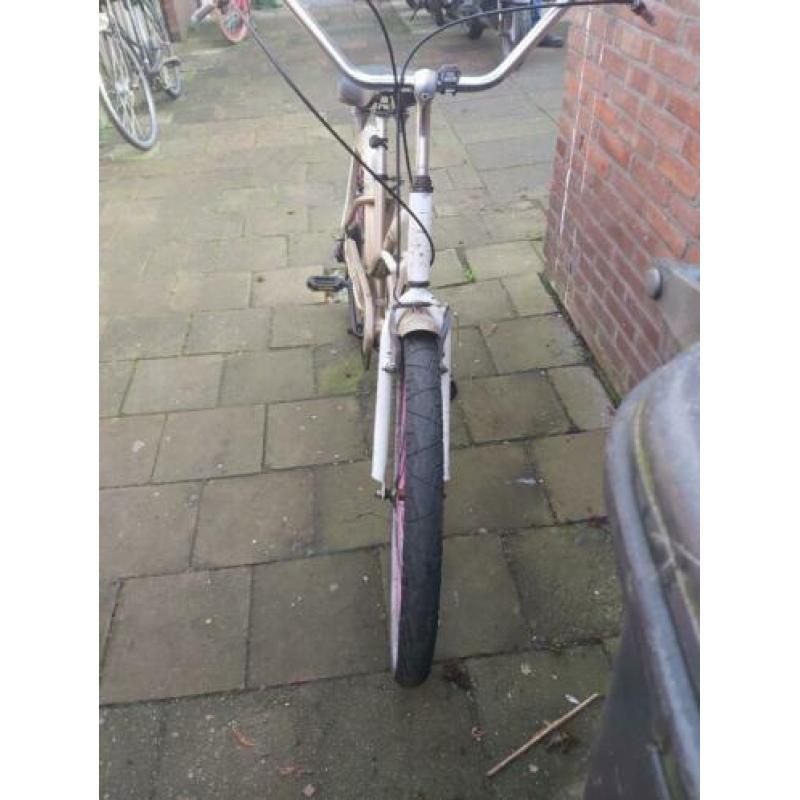 te koop damesfiets cruiser fiets goud met wit