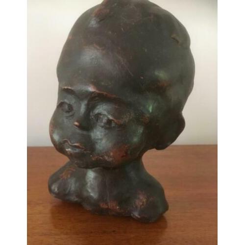 Oud terra cotta kinderhoofdje