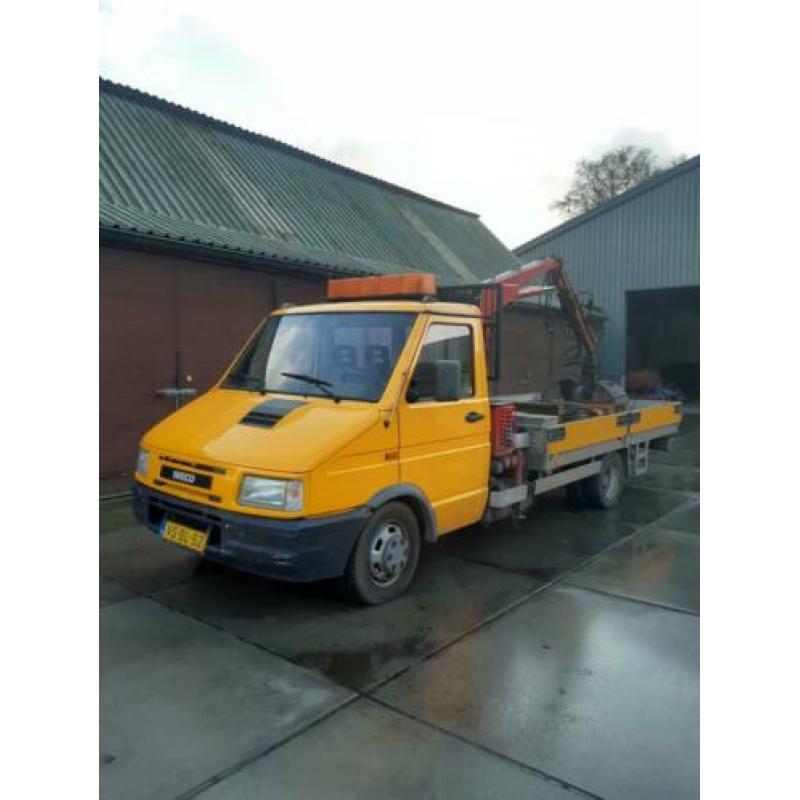 Iveco Daily incl kraan en knijpbak
