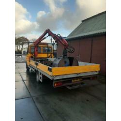 Iveco Daily incl kraan en knijpbak
