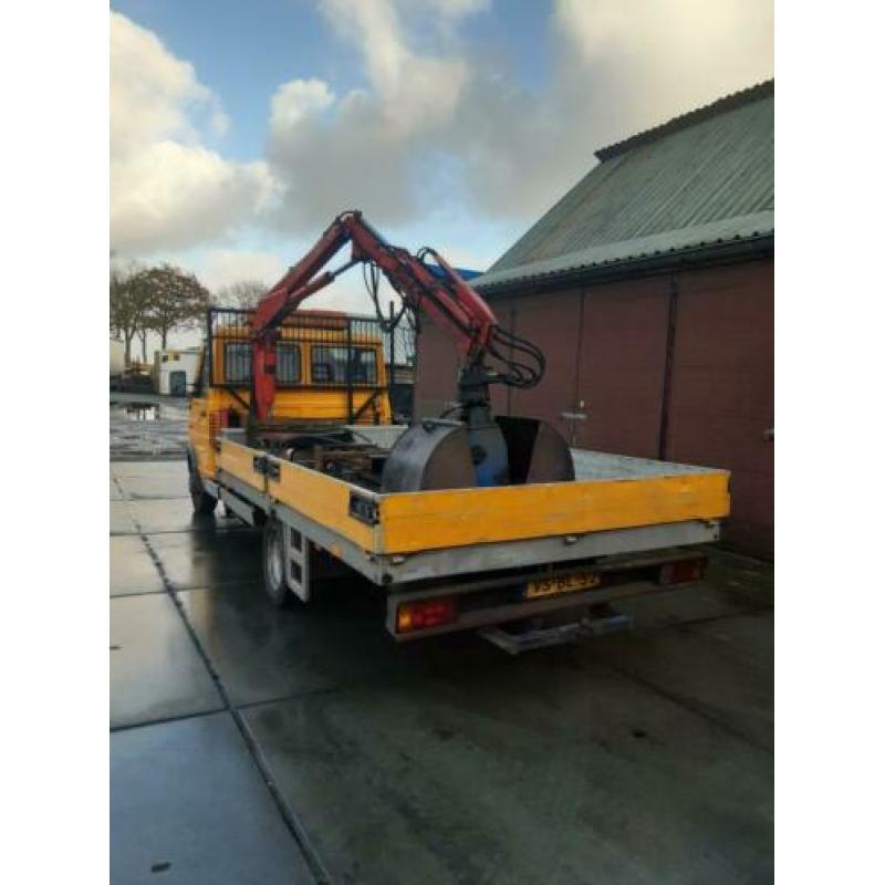 Iveco Daily incl kraan en knijpbak