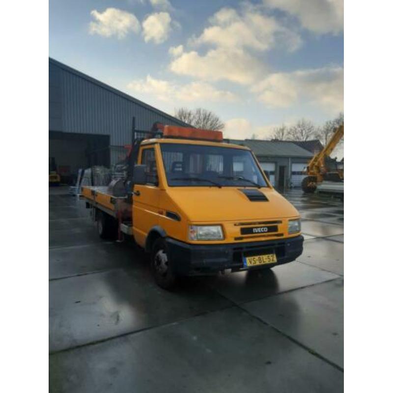 Iveco Daily incl kraan en knijpbak