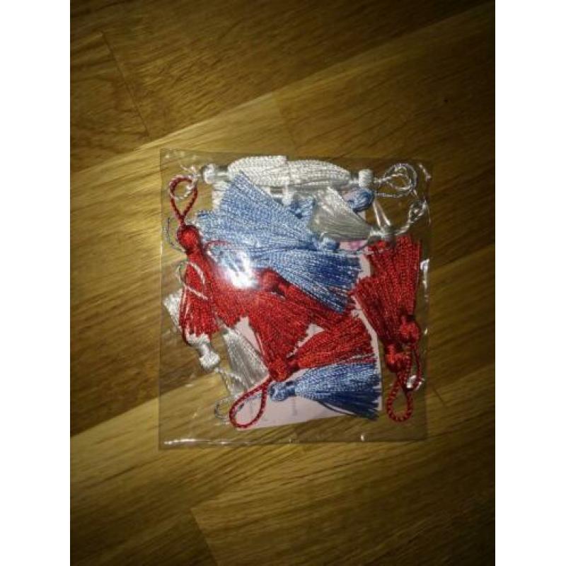 Flosjesband blauw 2,95m, bolletjesband oranje 3m, franjeband
