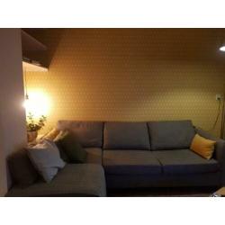 Hoek bankbed/slaapbank grijs 2 jaar oud