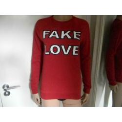 NIKKIE trui met opdruk MAAT 38 (FAKE LOVE)