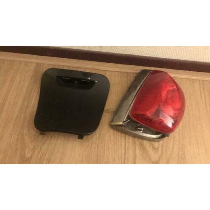 Vespa LX onderdelen koplamp, kappen