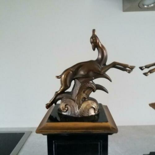 ART DECO herten op pilaren