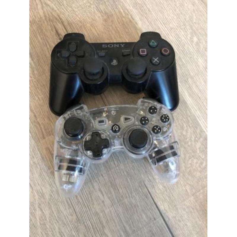PS3 met 2 controllers , 2 motion controllers, cam ,38 games